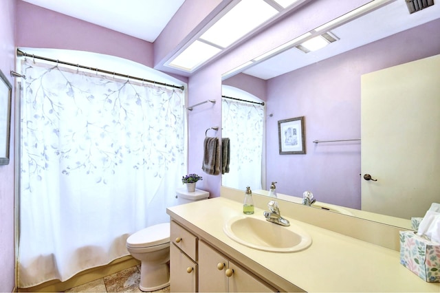 full bathroom featuring toilet, vanity, and shower / bath combination with curtain