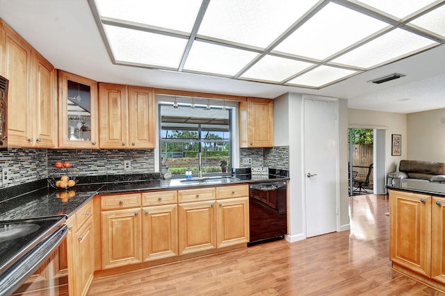 foyer entrance featuring hardwood / wood-style flooring and lofted ceiling