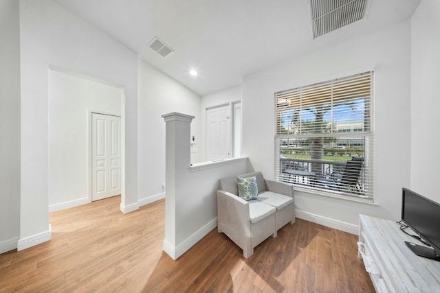 living area featuring hardwood / wood-style flooring