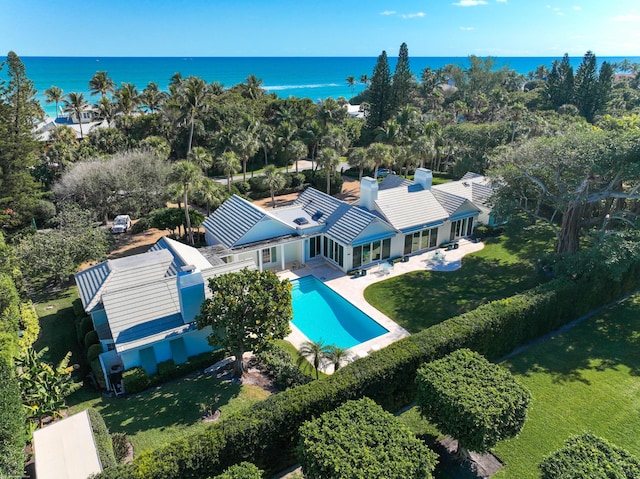 birds eye view of property featuring a water view