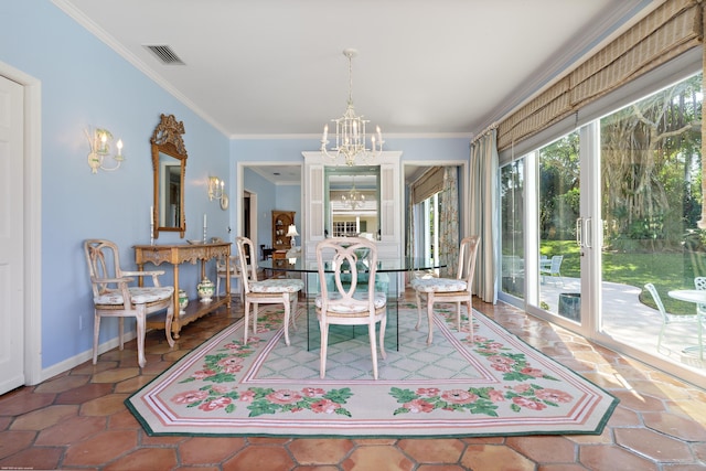 dining area with a chandelier and ornamental molding