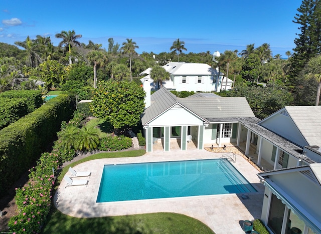 view of swimming pool featuring a patio