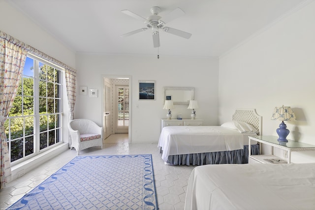 tiled bedroom with crown molding, ceiling fan, and access to outside