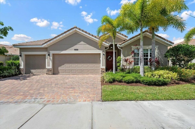 view of front of property featuring a garage