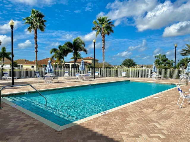 view of pool featuring a patio