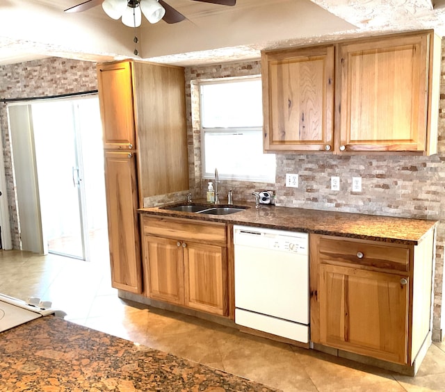 kitchen with ceiling fan, light tile patterned flooring, white dishwasher, and sink