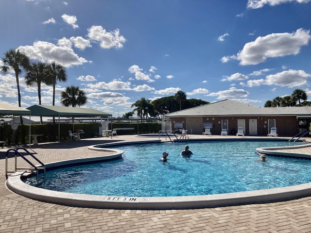 view of swimming pool featuring a patio