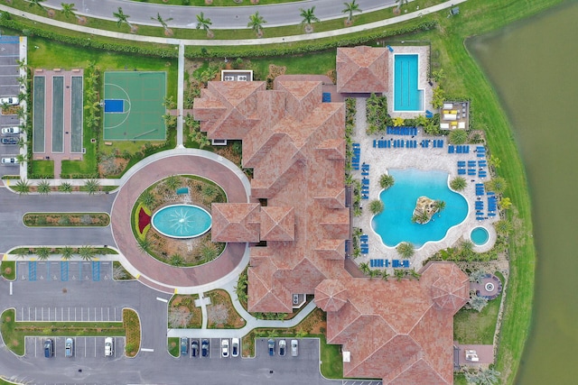 birds eye view of property featuring a water view