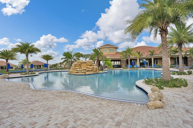 view of pool featuring a patio area