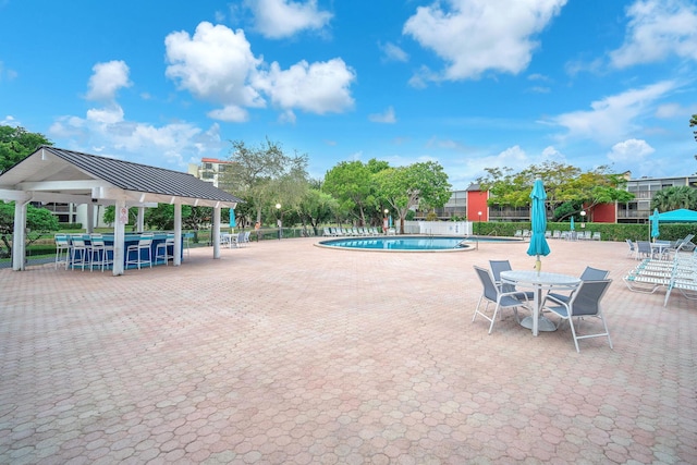 view of swimming pool with a gazebo