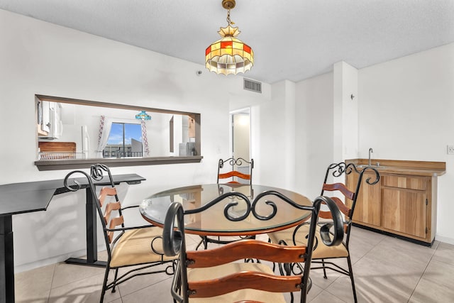 view of tiled dining space