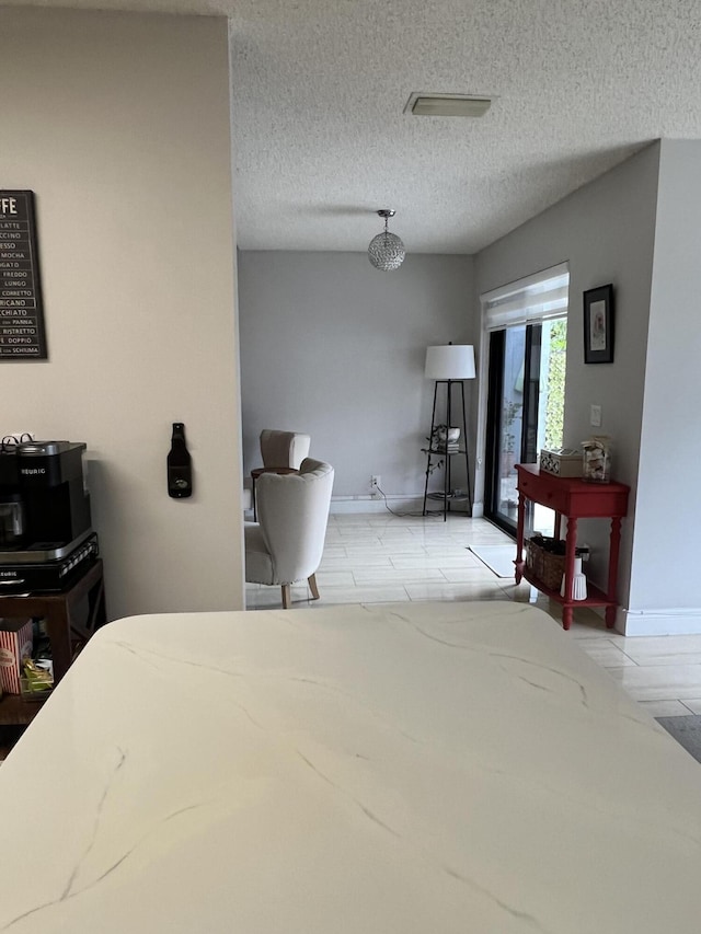 bedroom with a textured ceiling