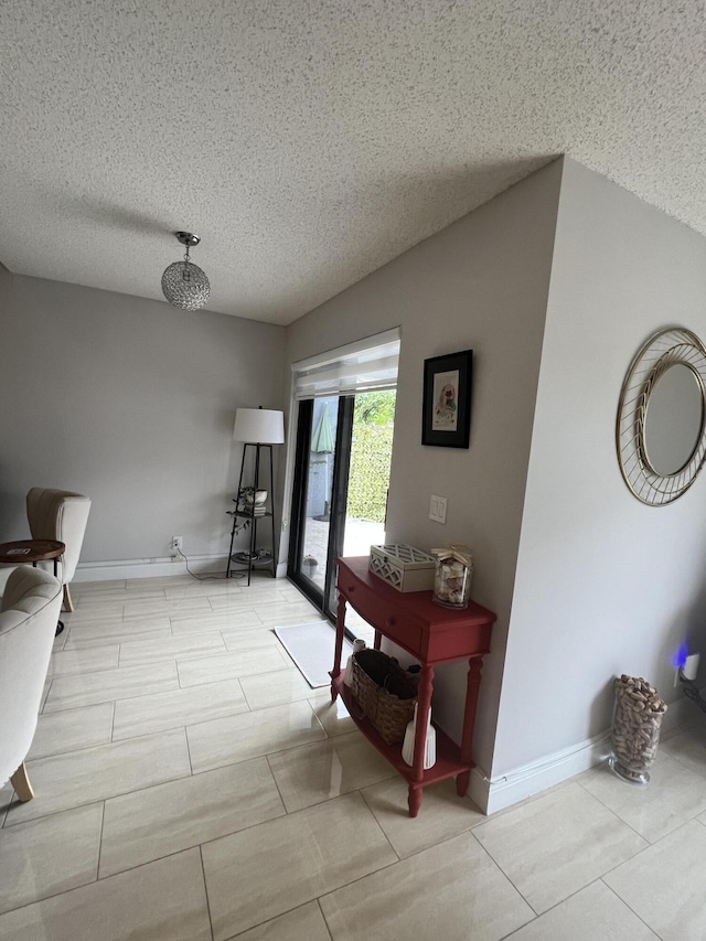 interior space featuring a textured ceiling