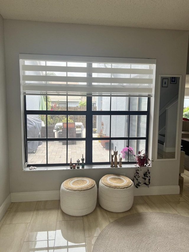 interior space featuring a textured ceiling