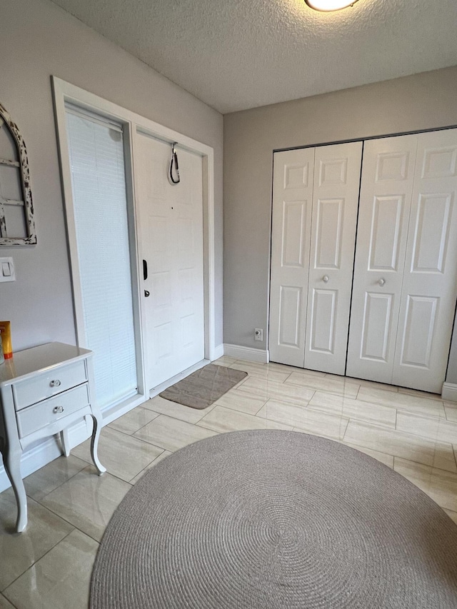 bedroom with a textured ceiling