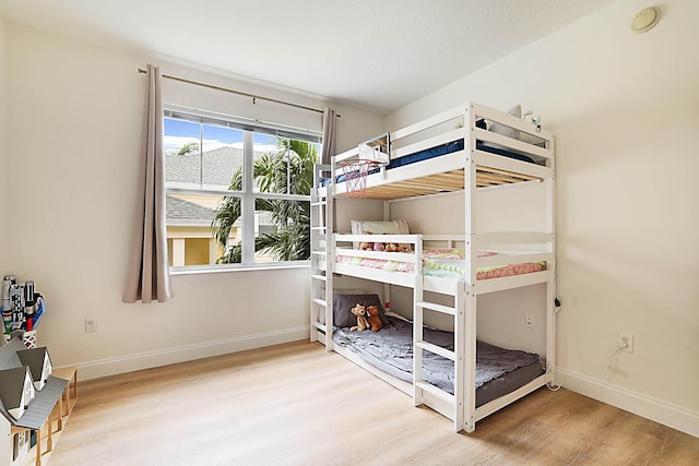 unfurnished bedroom featuring hardwood / wood-style floors