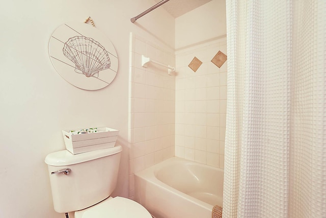 bathroom with toilet and shower / bathtub combination with curtain