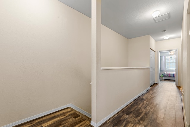 hall featuring dark hardwood / wood-style floors