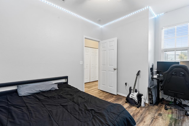 bedroom featuring hardwood / wood-style flooring