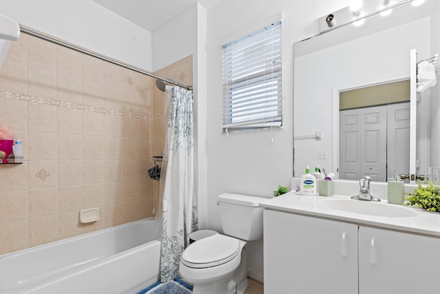 full bathroom featuring vanity, toilet, and shower / tub combo