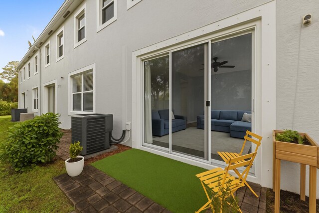 5138 White Oleander, West Palm Beach, FL 33415 - back of property featuring central AC and stucco siding