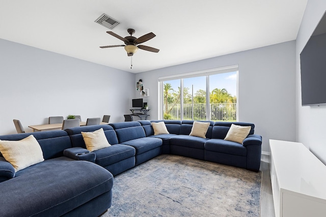 5138 White Oleander, West Palm Beach, FL 33415 - living area with light wood-style floors and ceiling fan