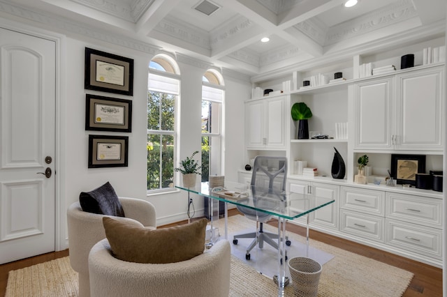 office area featuring coffered ceiling, ornamental molding, dark hardwood / wood-style flooring, and plenty of natural light