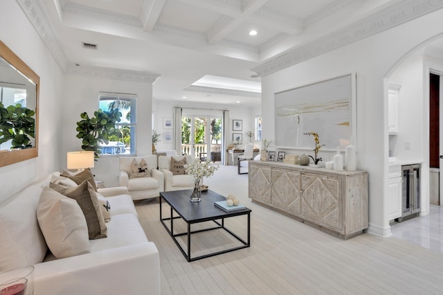 living room featuring coffered ceiling, crown molding, beverage cooler, and beamed ceiling