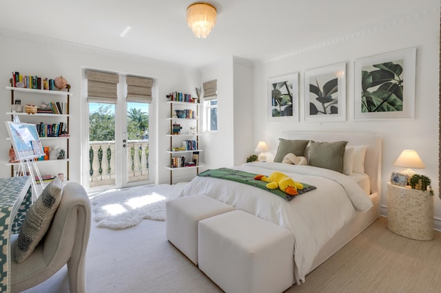 bedroom featuring ornamental molding and light colored carpet