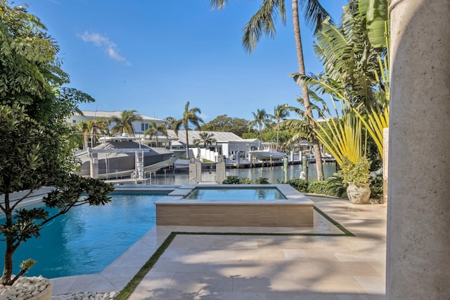 view of pool with a water view and a boat dock