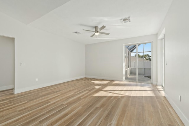 empty room with ceiling fan and light wood-type flooring