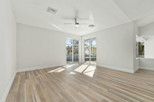 unfurnished room featuring ceiling fan and light wood-type flooring