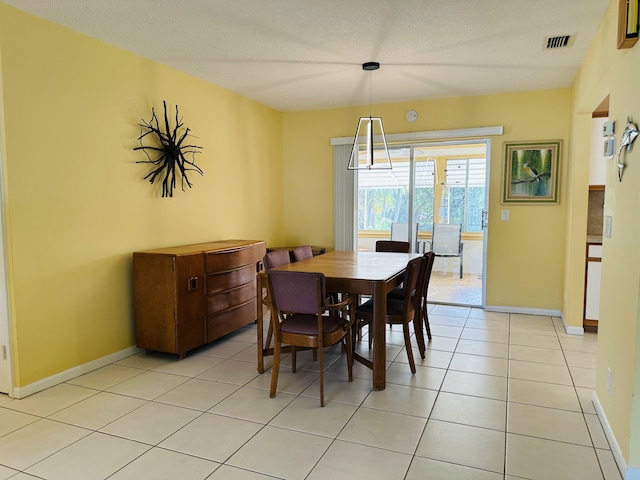 view of tiled dining space