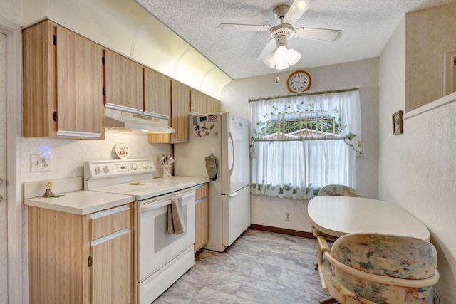 kitchen featuring a textured ceiling, ceiling fan, and white appliances