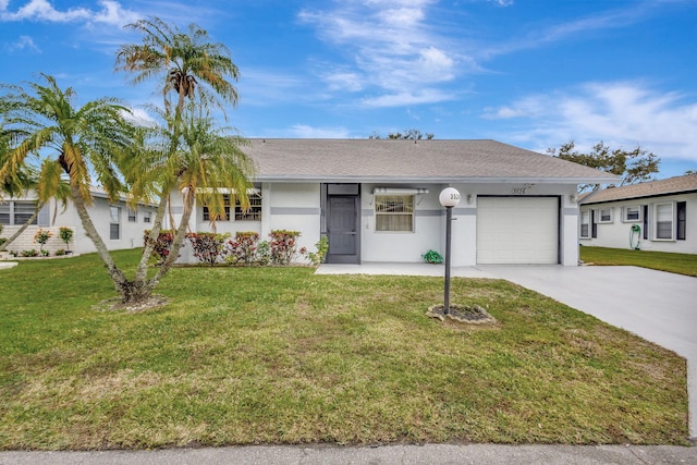 single story home featuring a garage and a front lawn