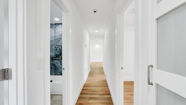 hallway featuring light wood-type flooring