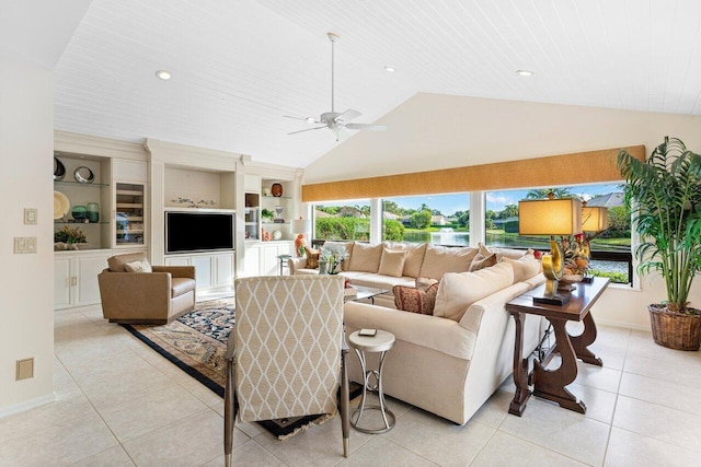 living room featuring light tile patterned floors, plenty of natural light, and built in features