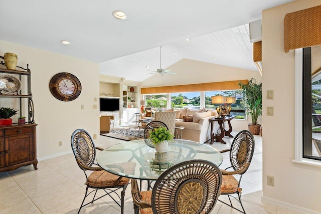 dining space with ceiling fan, vaulted ceiling, built in features, and light tile patterned floors