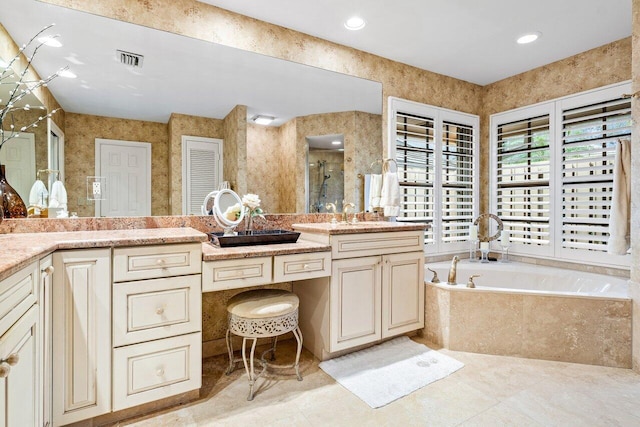 bathroom featuring tile patterned floors, vanity, and independent shower and bath