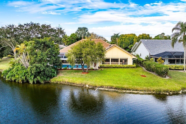 birds eye view of property featuring a water view