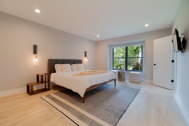 bedroom featuring light wood-type flooring