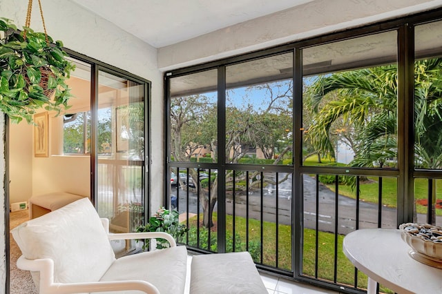 sunroom / solarium with a healthy amount of sunlight