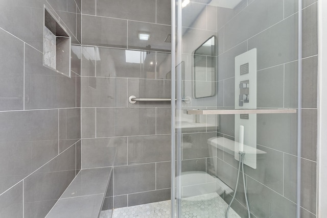 bathroom featuring walk in shower