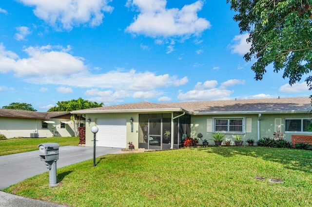 6187 Overland Pl, Delray Beach, FL 33484 - ranch-style home featuring a garage, a sunroom, and a front lawn