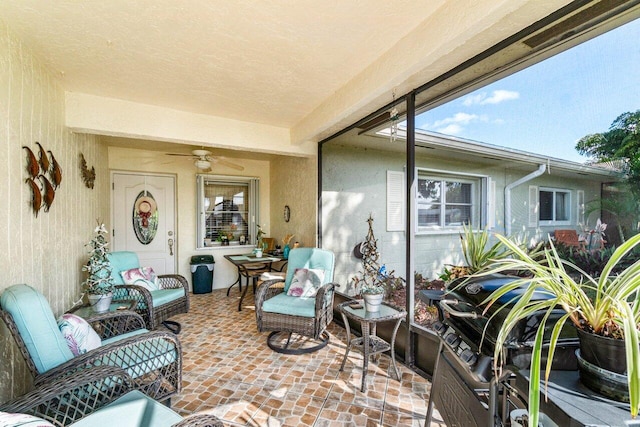 view of patio with ceiling fan and outdoor lounge area