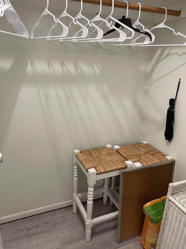 mudroom featuring wood-type flooring