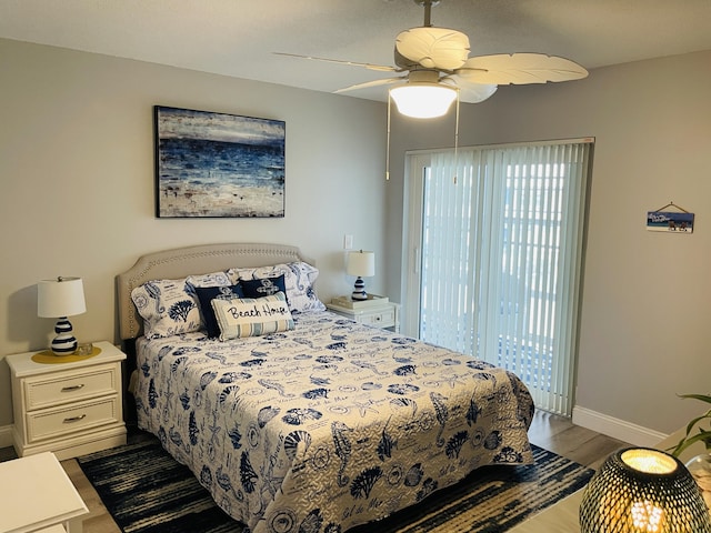 bedroom featuring ceiling fan and light hardwood / wood-style floors