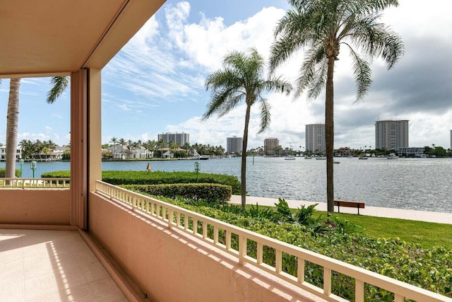 balcony featuring a water view