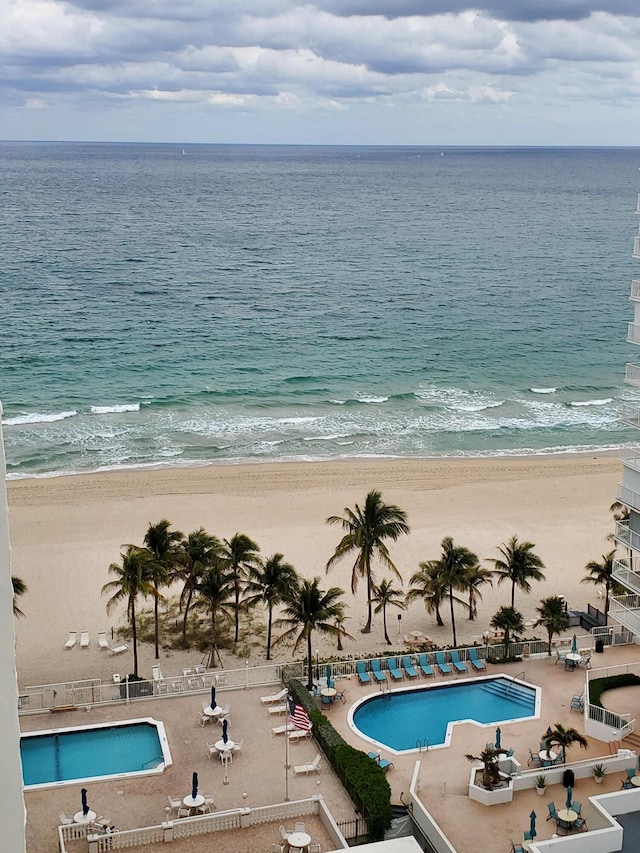 property view of water featuring a beach view