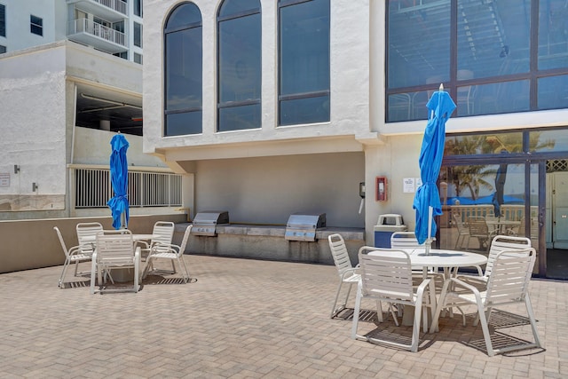 view of patio with a grill and area for grilling